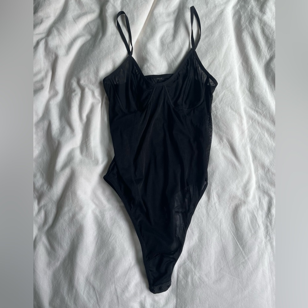 Black mesh body suit